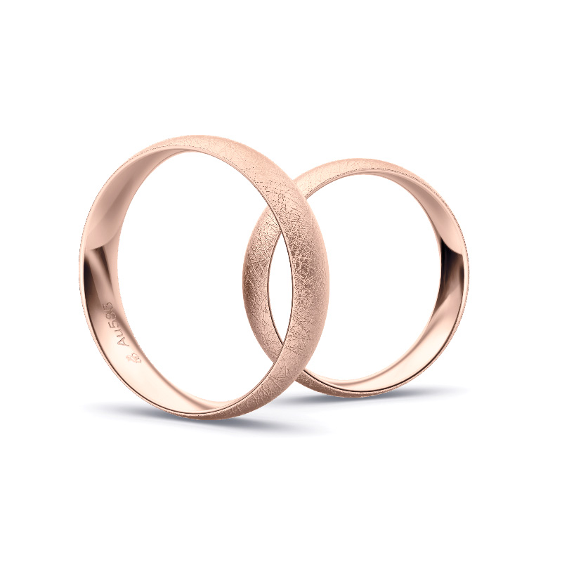 Aufnahme von schlichten eismatten Trauringen aus Rosegold mit Diamant mit 4,5 mm Breite