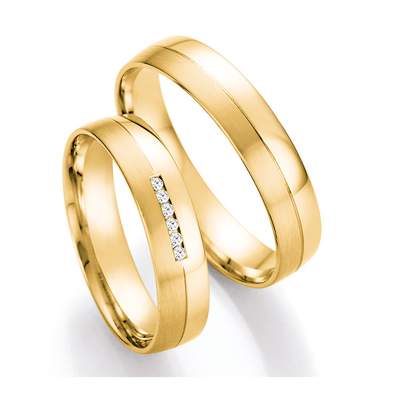 Edle Eheringe aus Gelbgold mit sechs strahlenden Diamanten 4560079