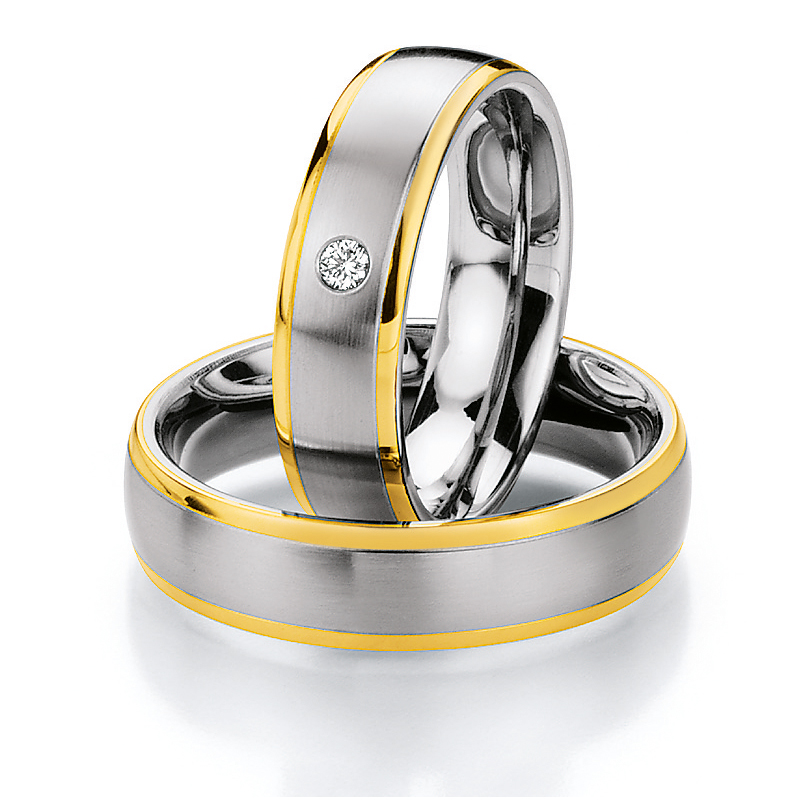 Eheringe Trauringe aus Stahl & Gelbgold mit Diamant Ruesch Collection Nowotny 88/01300-060