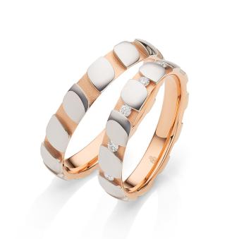 Beeindruckend designte Weißgold&Roségold Eheringe mit 5 Diamanten